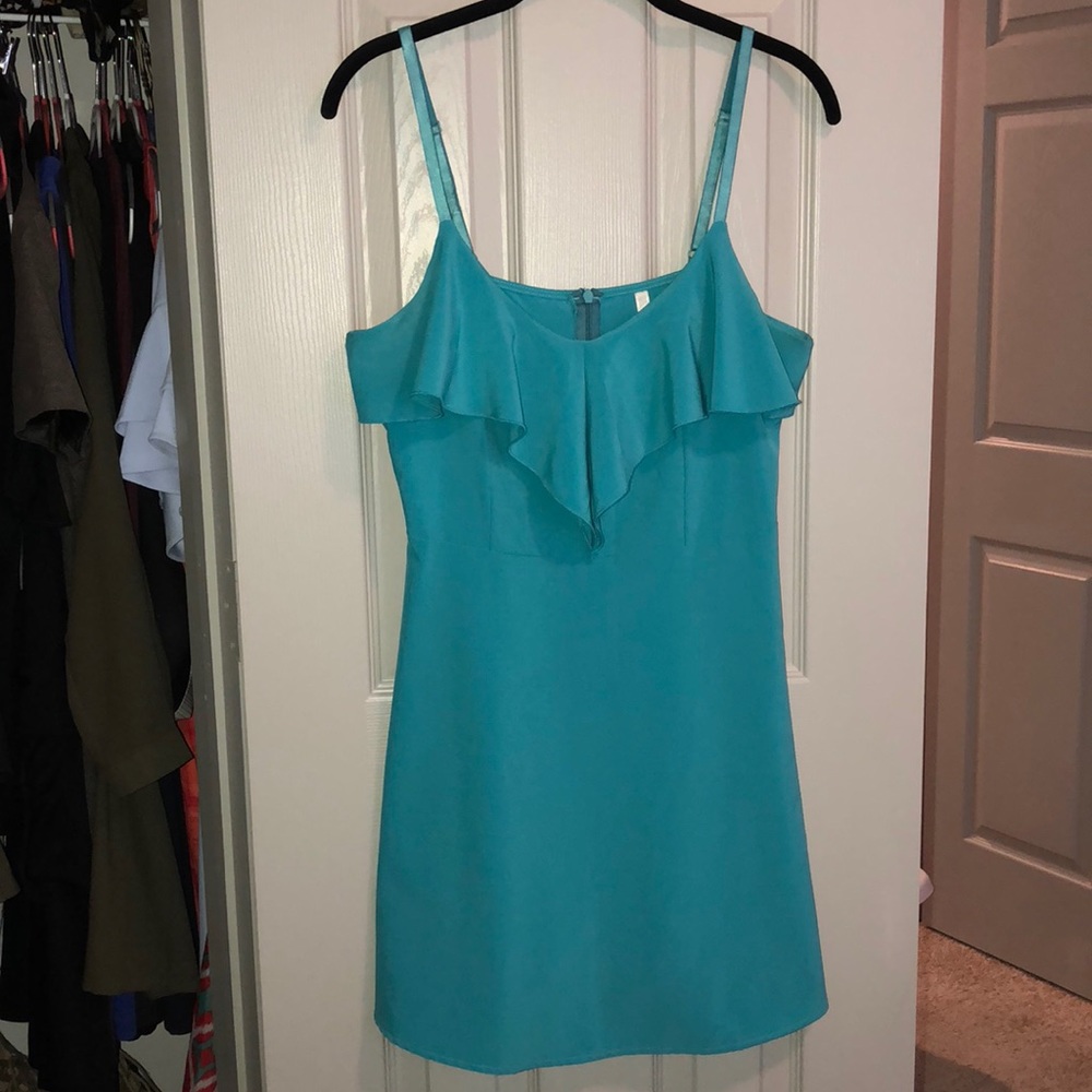 Adorable turquoise ruffle dress!